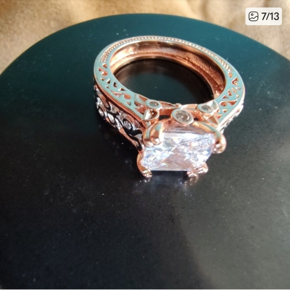 CZ ring. Rose gold and silver toned filigree. Size 8